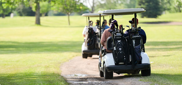 two golf carts on golf course