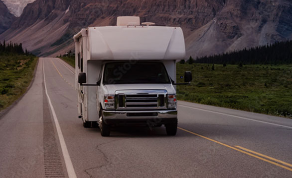 RV driving down road
